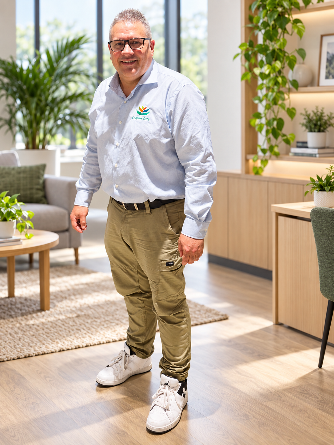 Christopher Reid wearing a Cenplus Care shirt
